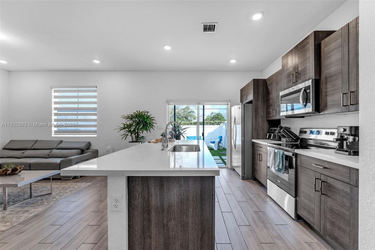 Interior, Kitchen, Living room, Recessed Lighting, Stainless Steel Appliances, Wood Texture Flooring