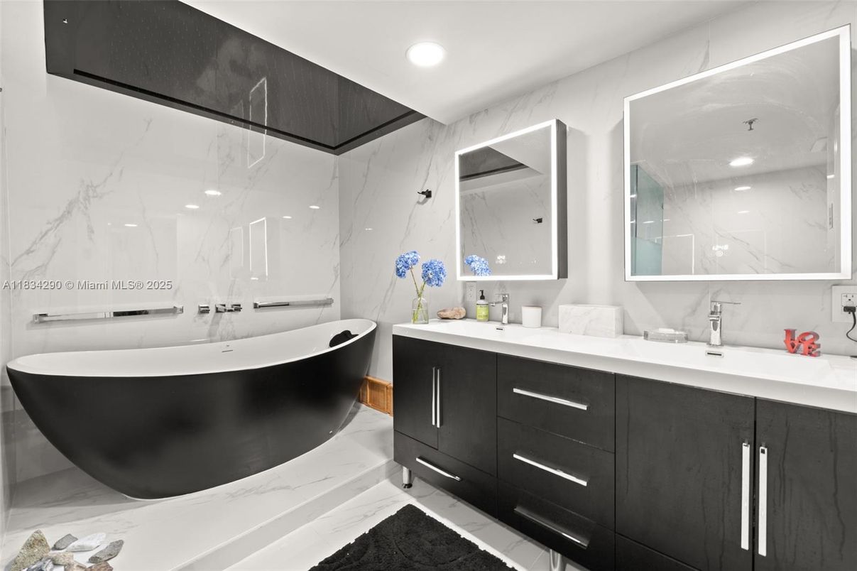 Bathroom, Dual Sink Vanities, Free Standing Baths, Interior, Marble, Marble Walls, Recessed Lighting