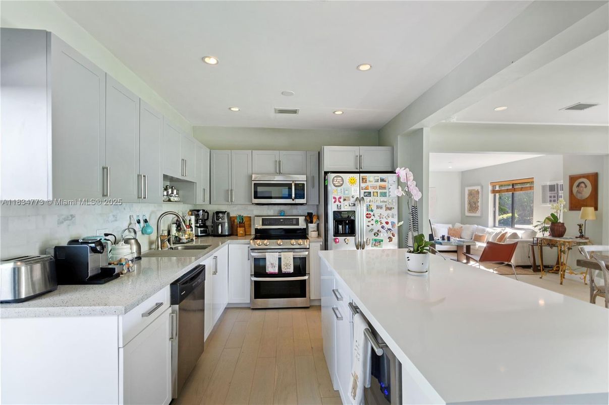 Dining room, Interior, Kitchen, Recessed Lighting, Stainless Steel Appliances, Wood Texture Flooring