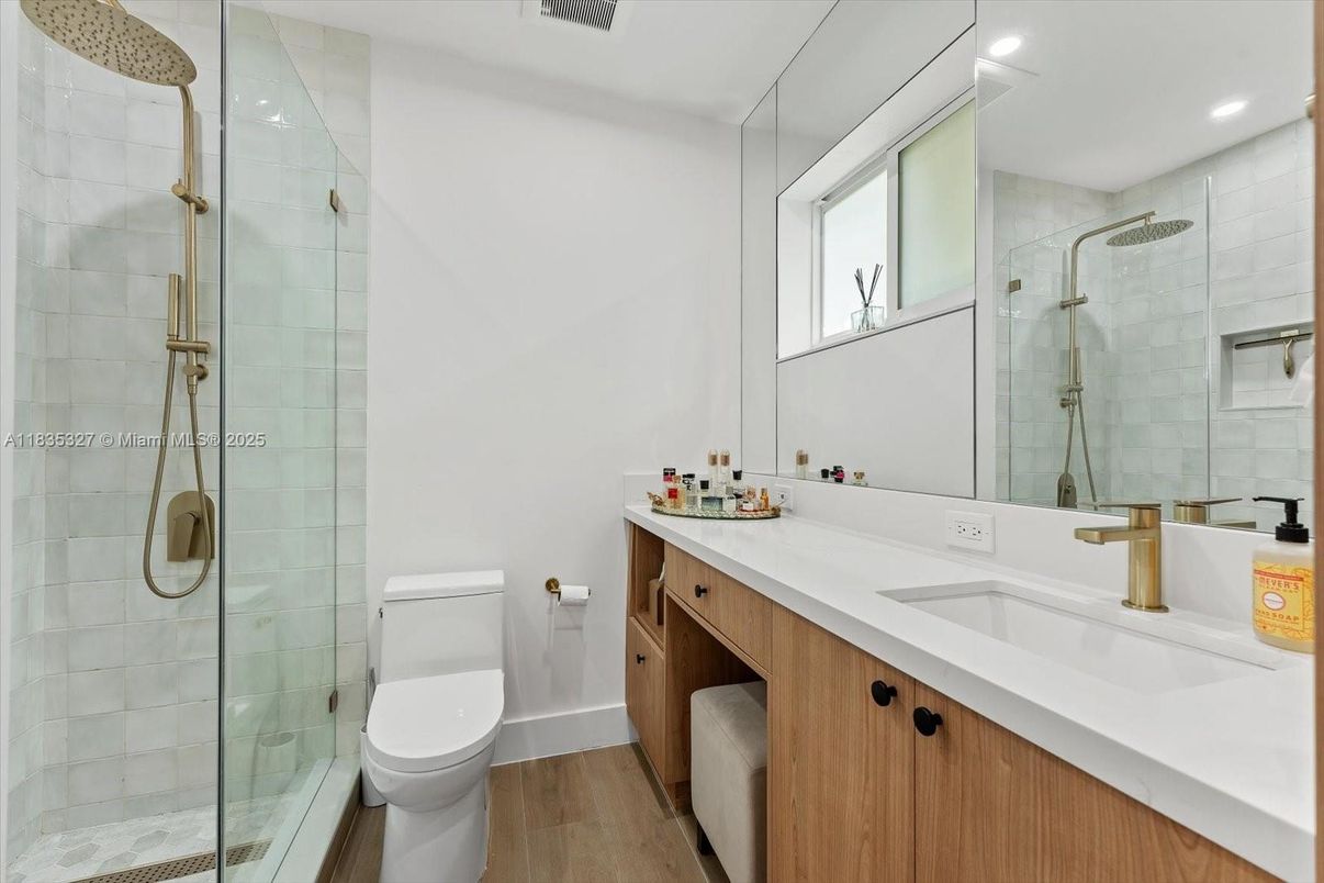 Bathroom, Dual Sink Vanities, Glass Shower, Interior, Recessed Lighting, Wood Texture Flooring