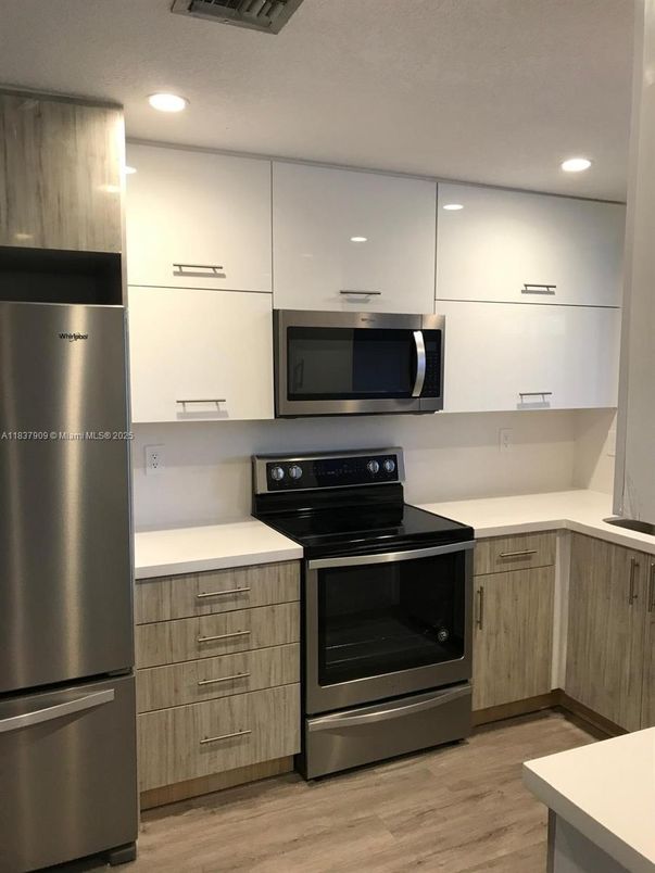 Interior, Kitchen, Recessed Lighting, Stainless Steel Appliances, Wood Texture Flooring
