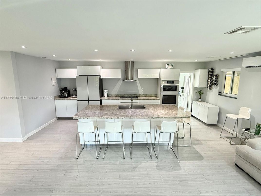 Interior, Kitchen, Living room, Recessed Lighting, Stainless Steel Appliances, Wood Texture Flooring