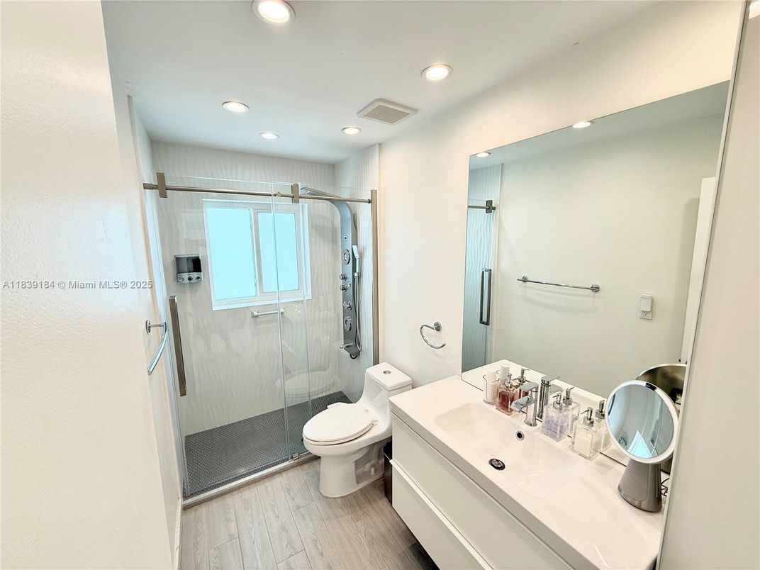 Bathroom, Glass Shower, Interior, Recessed Lighting, Wood Texture Flooring