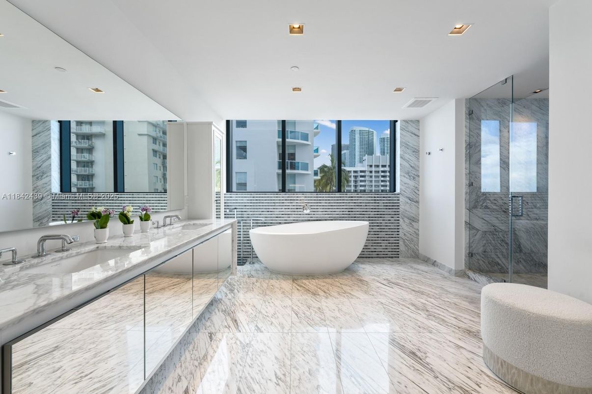 Bathroom, Dual Sink Vanities, Free Standing Baths, Glass Shower, Interior, Marble, Marble Walls, Recessed Lighting