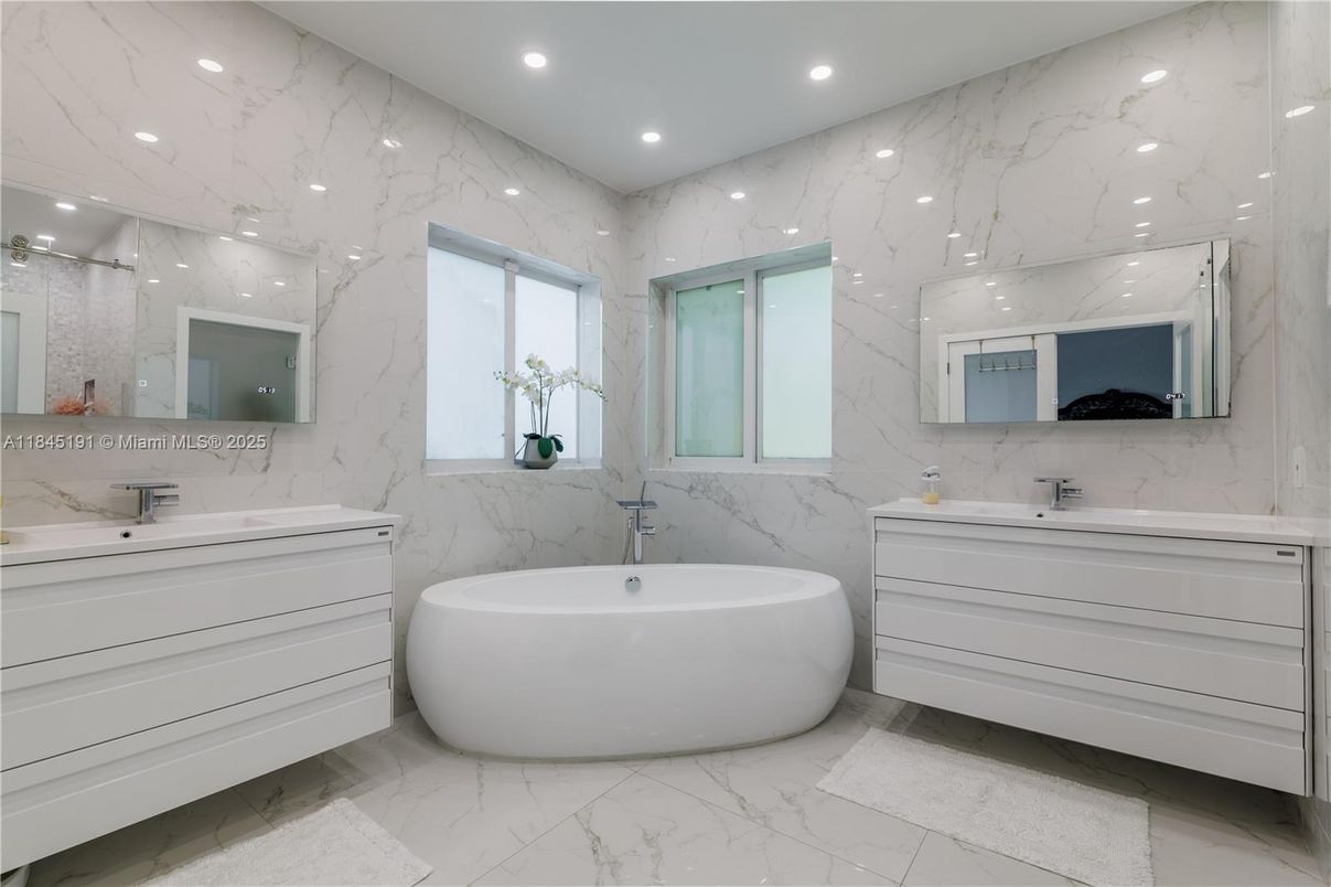 Bathroom, Dual Sink Vanities, Free Standing Baths, Interior, Marble, Marble Walls, Recessed Lighting