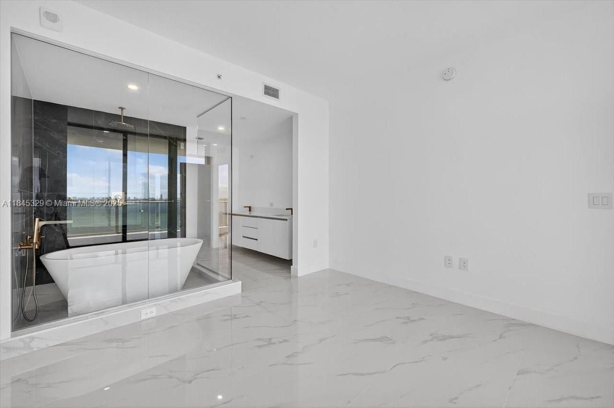 Bathroom, Free Standing Baths, Glass Shower, Interior, Marble, Recessed Lighting, Water