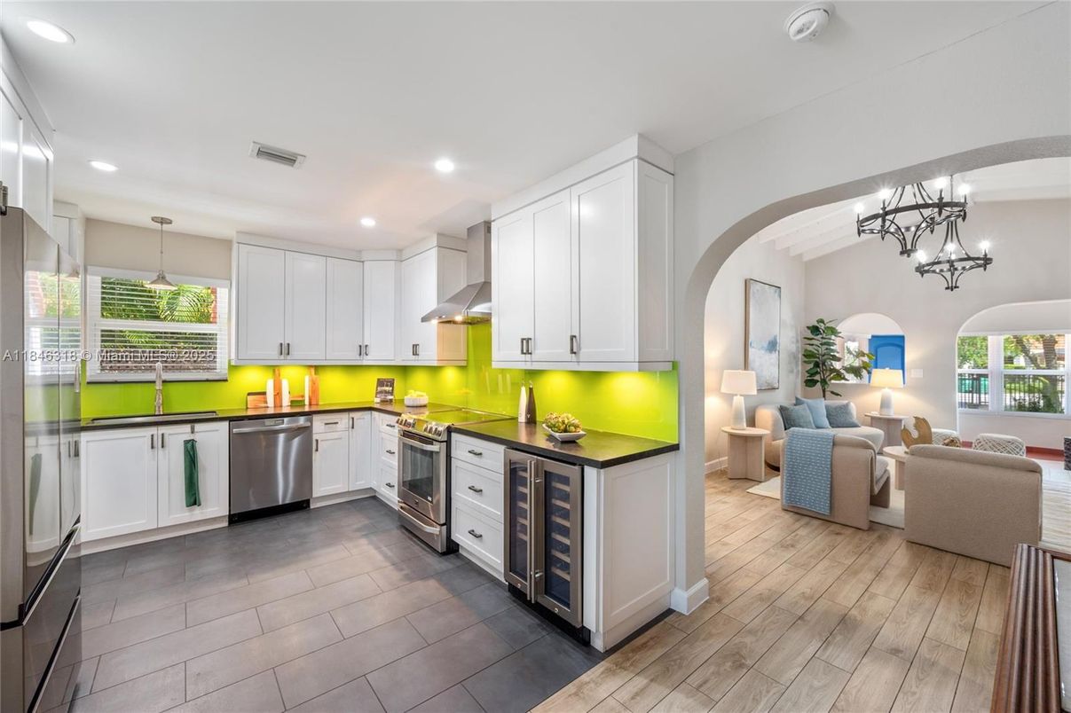 Chandelier, Interior, Kitchen, Living room, Recessed Lighting, Stainless Steel Appliances, Wood Texture Flooring