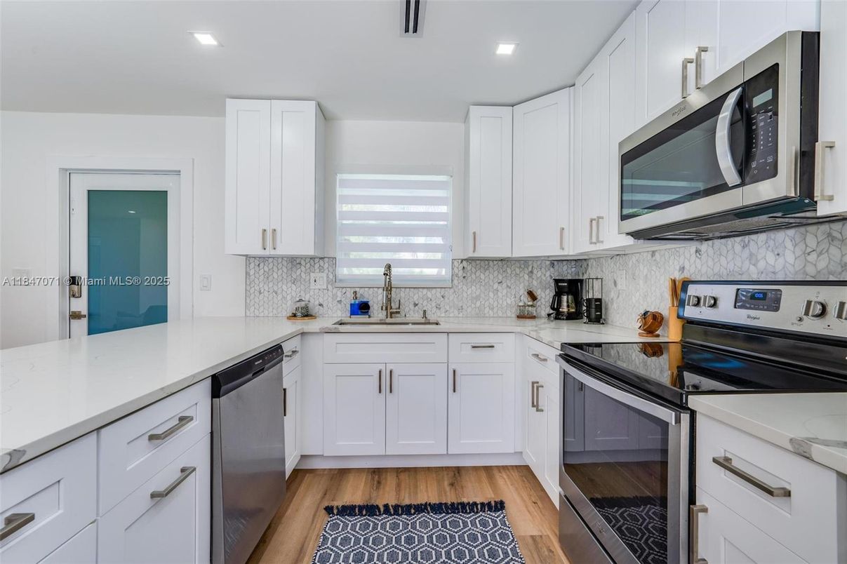 Interior, Kitchen, Recessed Lighting, Stainless Steel Appliances, Wood Texture Flooring