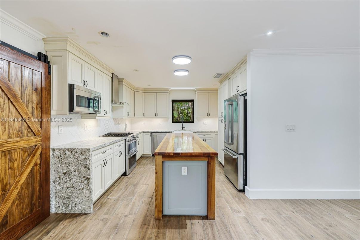 Interior, Kitchen, Recessed Lighting, Stainless Steel Appliances, Wood Texture Flooring