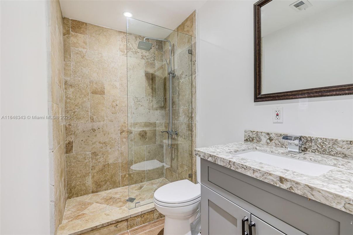 Bathroom, Glass Shower, Interior, Recessed Lighting, Stone Walls