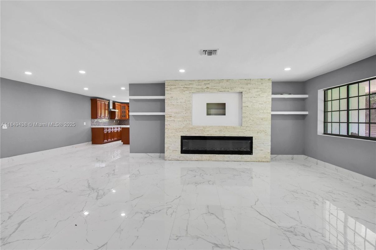 Empty room, Fireplace, Interior, Kitchen, Marble, Recessed Lighting, Stone Walls