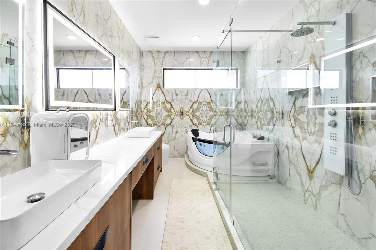 Bathroom, Dual Sink Vanities, Glass Shower, Interior, Marble Walls, Recessed Lighting