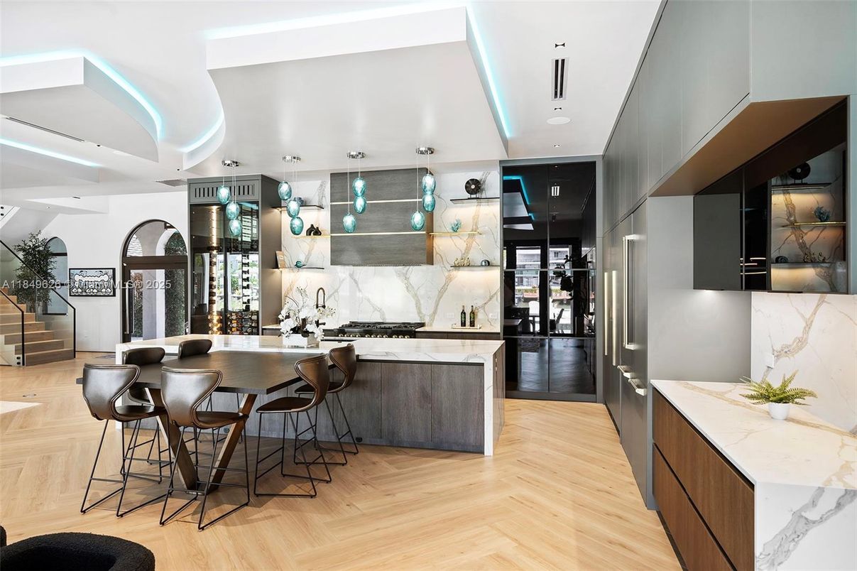 Interior, Kitchen, Marble Walls, Pendant Lights, Recessed Lighting, Wood Texture Flooring