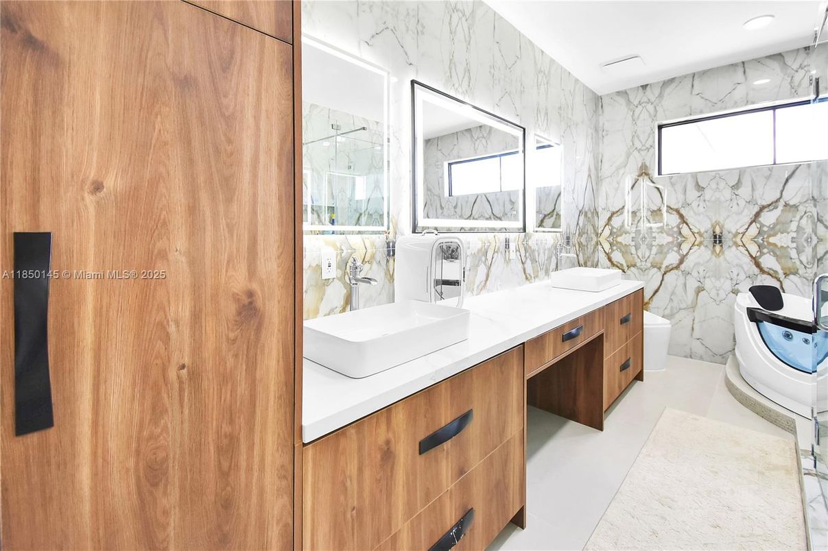 Bathroom, Dual Sink Vanities, Interior, Marble Walls, Recessed Lighting
