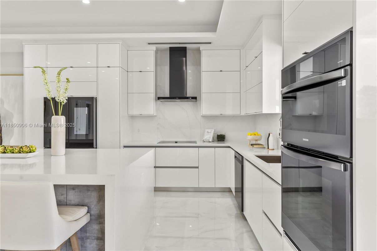 Interior, Kitchen, Marble, Marble Walls, Recessed Lighting, Stainless Steel Appliances