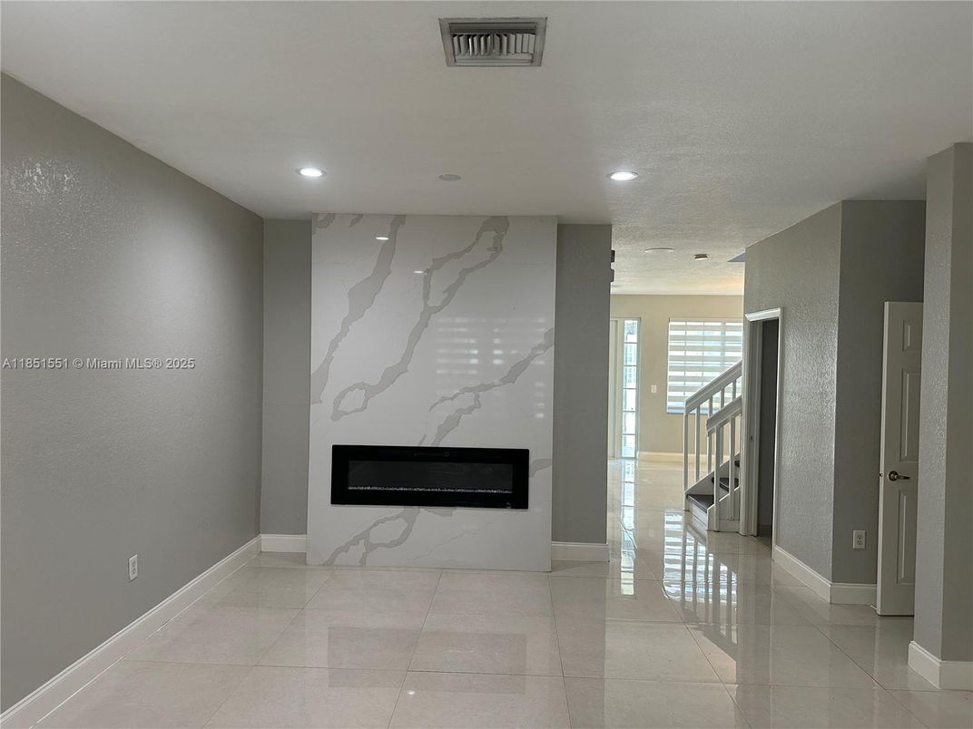 Fireplace, Interior, Marble Walls, Recessed Lighting