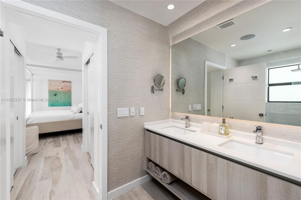 Bathroom, Dual Sink Vanities, Interior, Recessed Lighting, Wood Texture Flooring