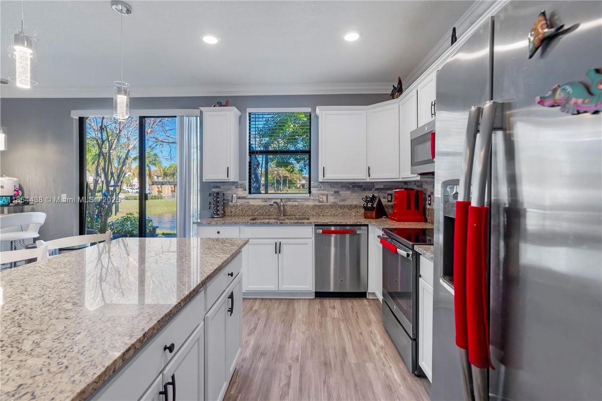 Interior, Kitchen, Pendant Lights, Recessed Lighting, Stainless Steel Appliances, Wood Texture Flooring