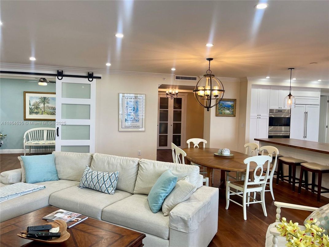 Dining room, Interior, Kitchen, Living room, Pendant Lights, Recessed Lighting, Stainless Steel Appliances, Wood Texture Flooring