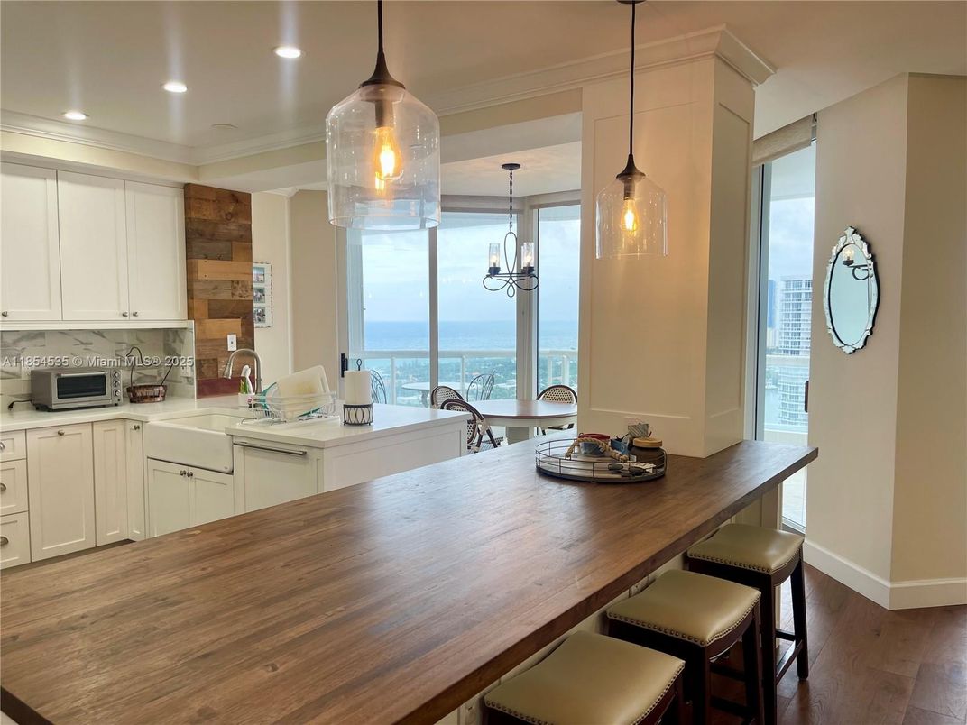 Dining room, Interior, Kitchen, Pendant Lights, Recessed Lighting, Water, Wood Texture Flooring