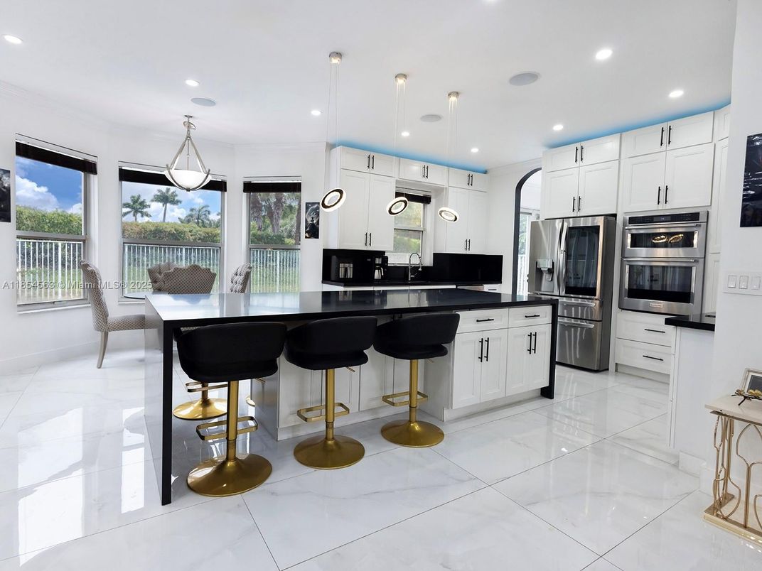 Dining room, Interior, Kitchen, Marble, Pendant Lights, Recessed Lighting, Stainless Steel Appliances