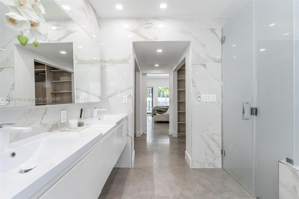 Bathroom, Dual Sink Vanities, Glass Shower, Interior, Marble Walls, Recessed Lighting