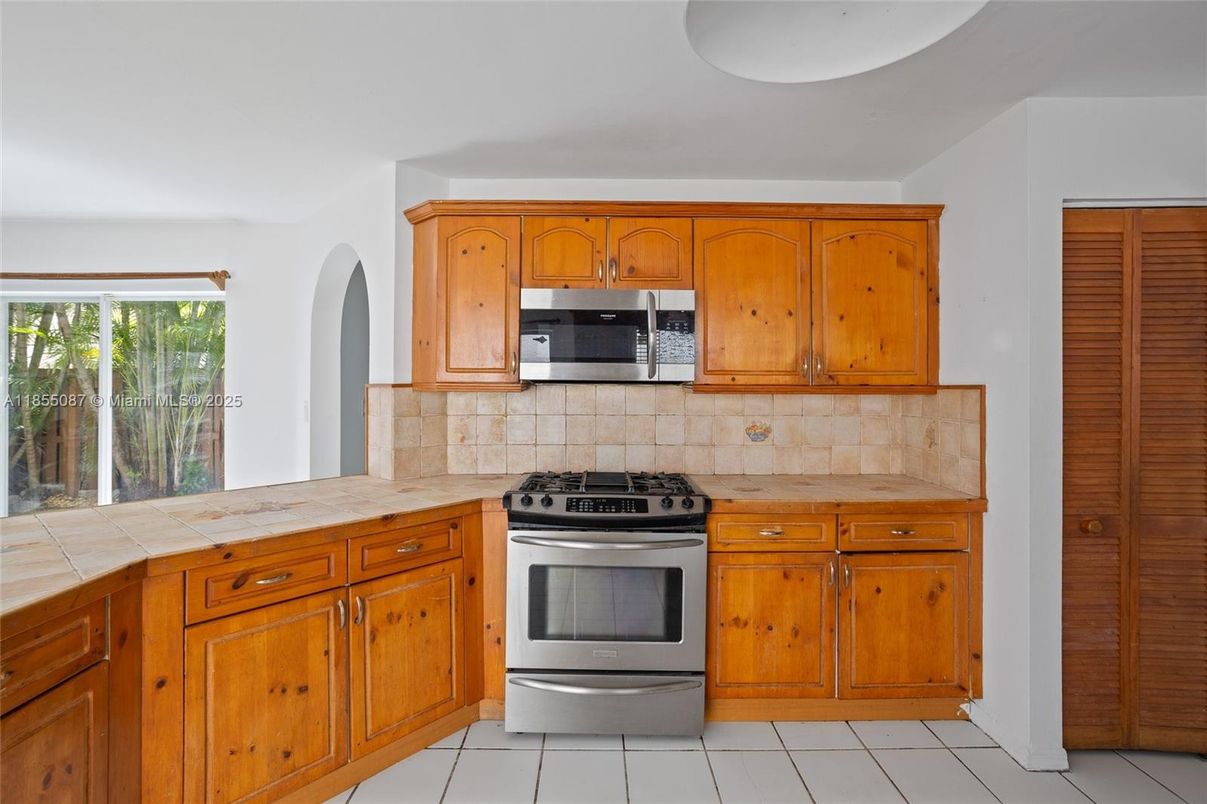 Interior, Kitchen, Stainless Steel Appliances, Tile Countertops