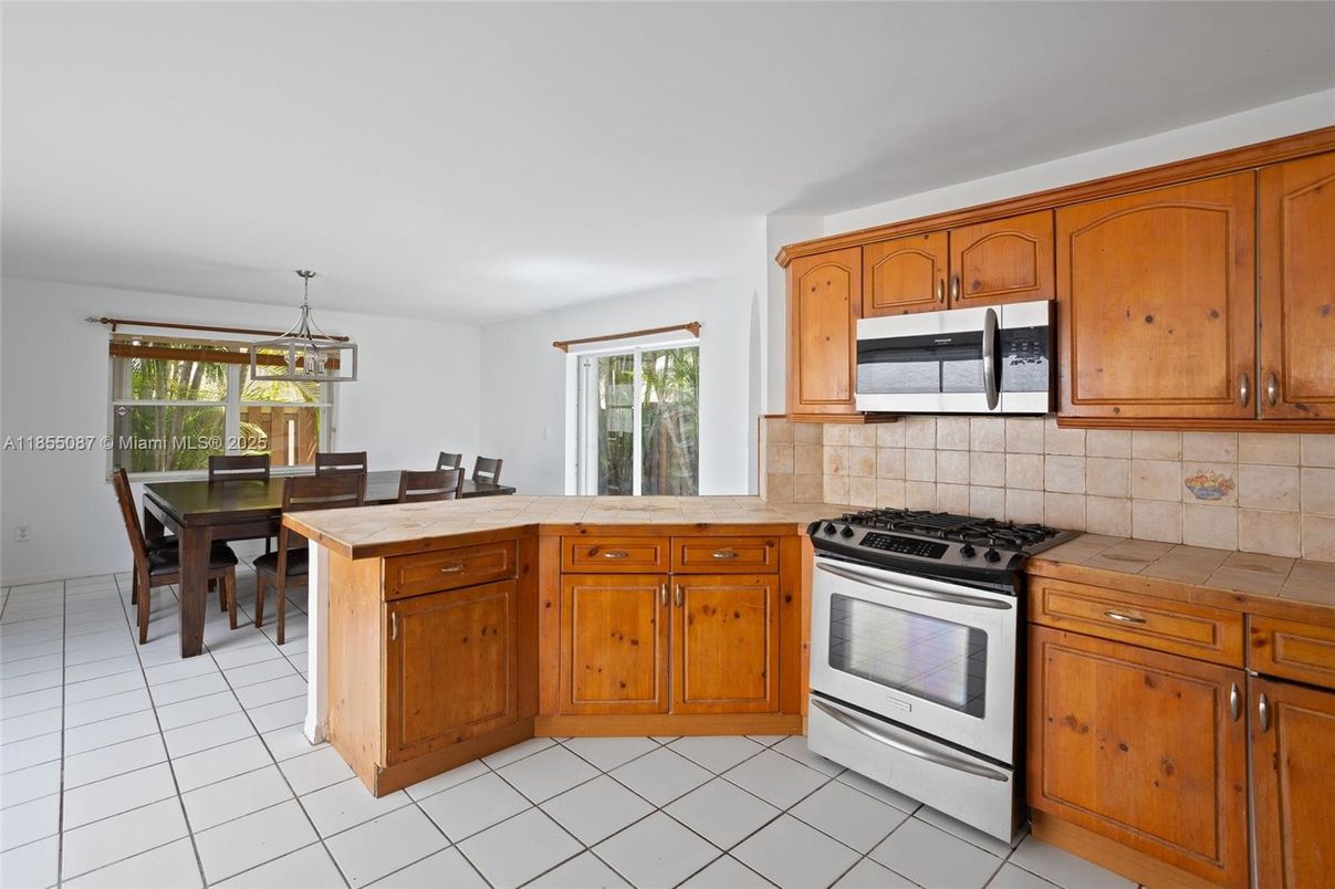 Dining room, Interior, Kitchen, Pendant Lights, Tile Countertops
