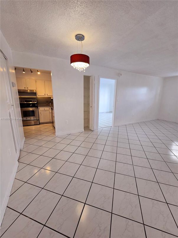 Chandelier, Empty room, Interior, Kitchen, Marble, Stainless Steel Appliances