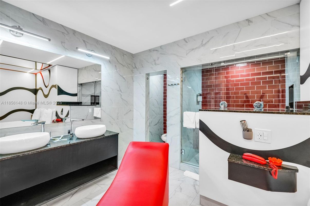 Bathroom, Dual Sink Vanities, Glass Shower, Interior, Marble, Marble Walls, Recessed Lighting