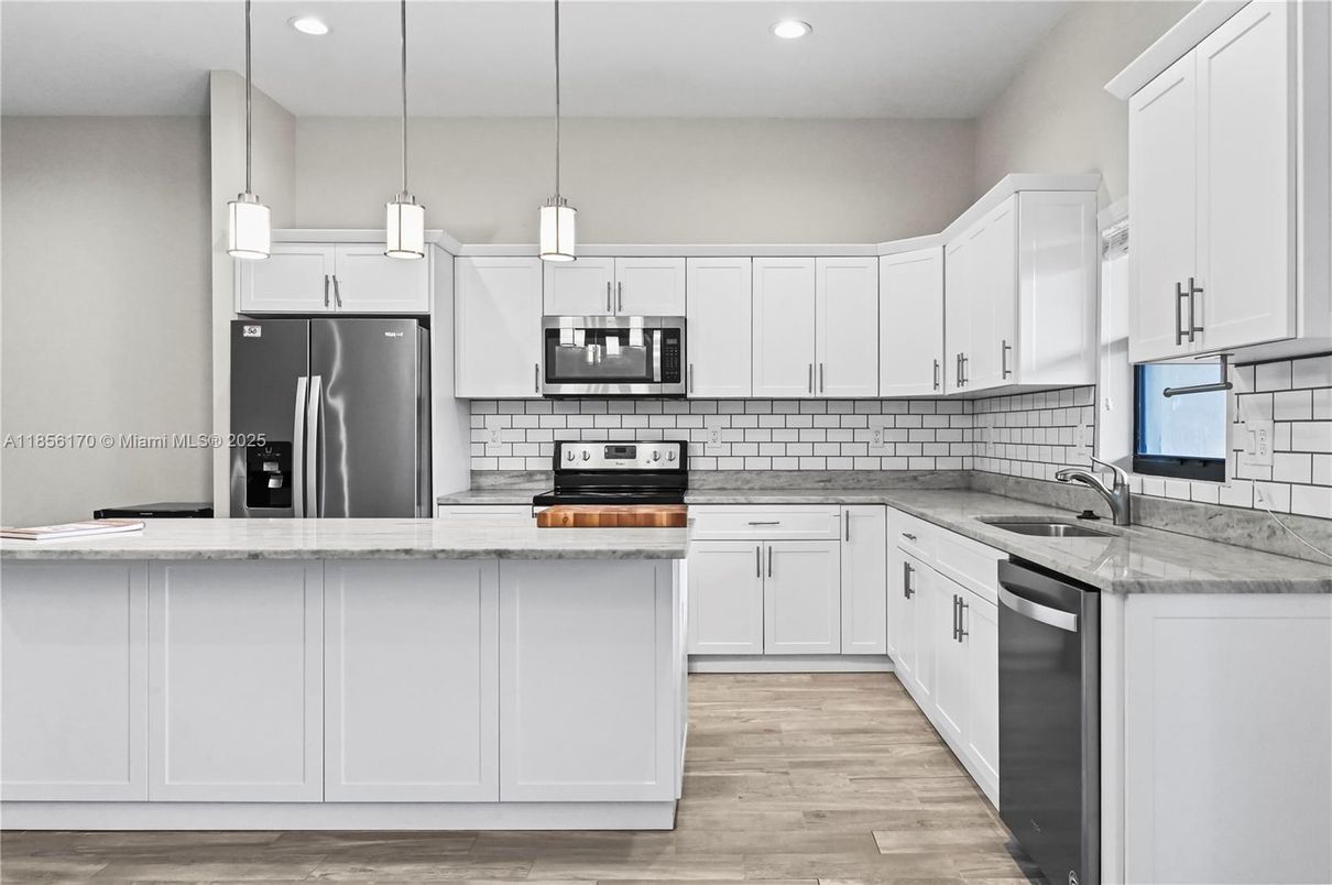 Interior, Kitchen, Pendant Lights, Recessed Lighting, Stainless Steel Appliances, Wood Texture Flooring