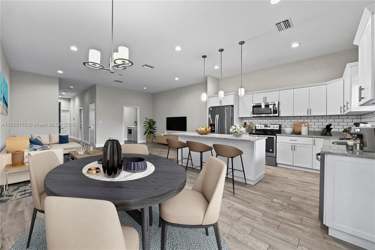 Dining room, Interior, Kitchen, Pendant Lights, Recessed Lighting, Stainless Steel Appliances, Wood Texture Flooring