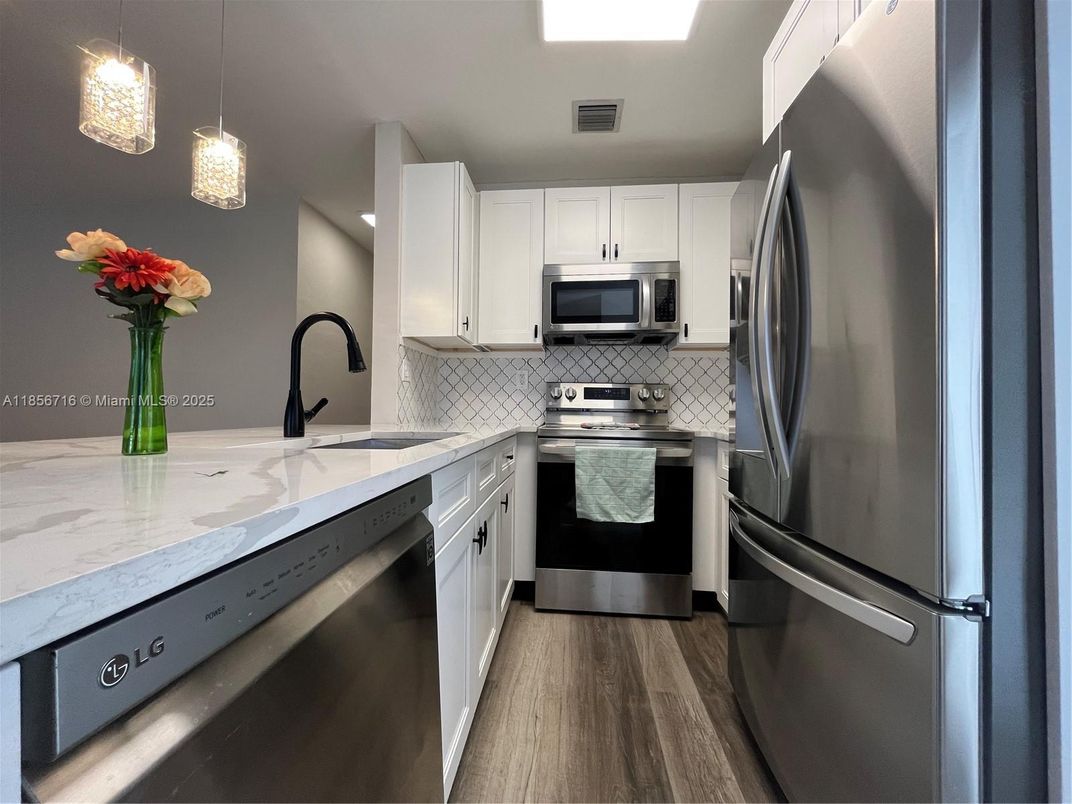 Interior, Kitchen, Pendant Lights, Recessed Lighting, Stainless Steel Appliances, Wood Texture Flooring