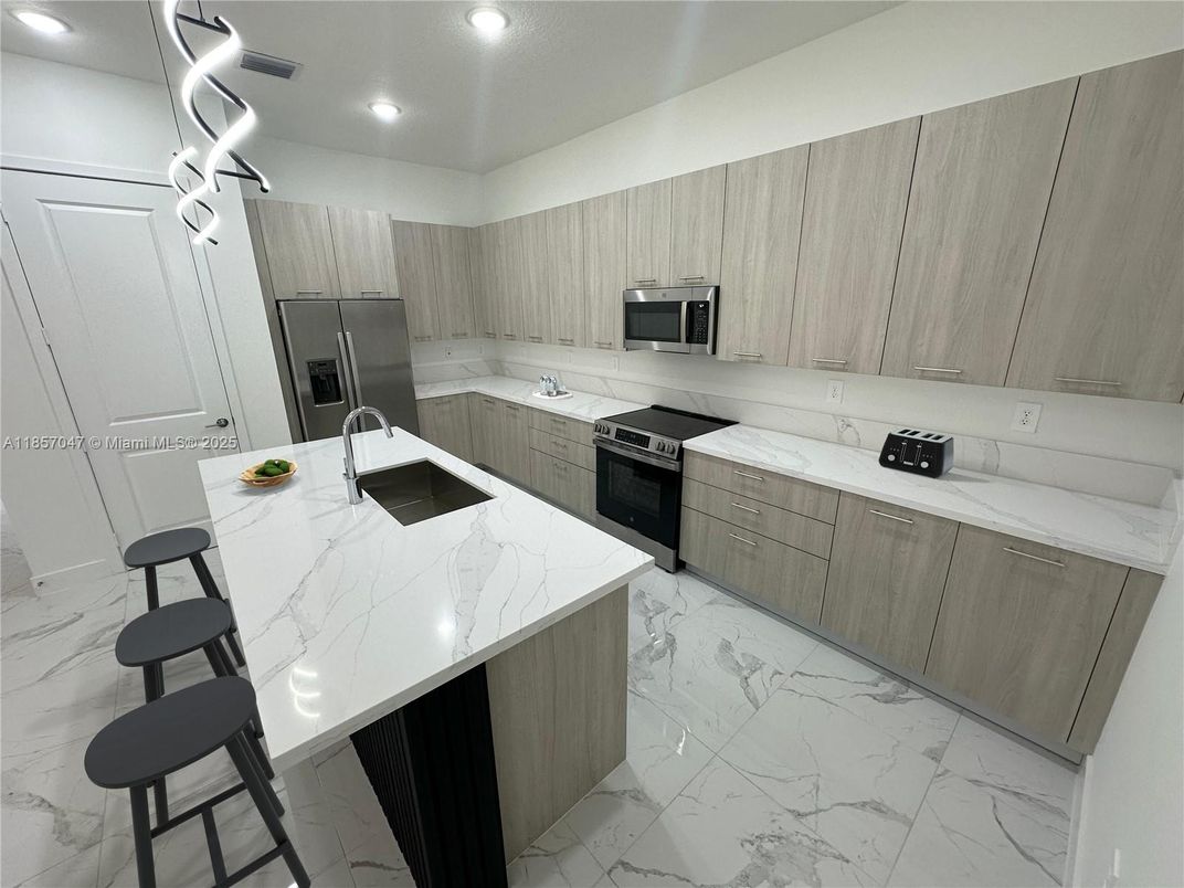 Interior, Kitchen, Marble, Recessed Lighting, Stainless Steel Appliances