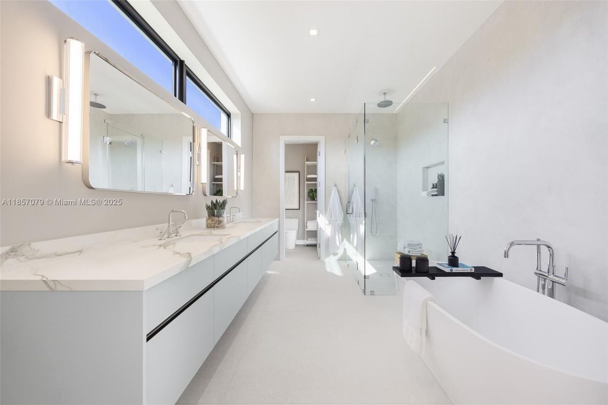 Bathroom, Dual Sink Vanities, Free Standing Baths, Glass Shower, Interior, Marble Walls, Recessed Lighting