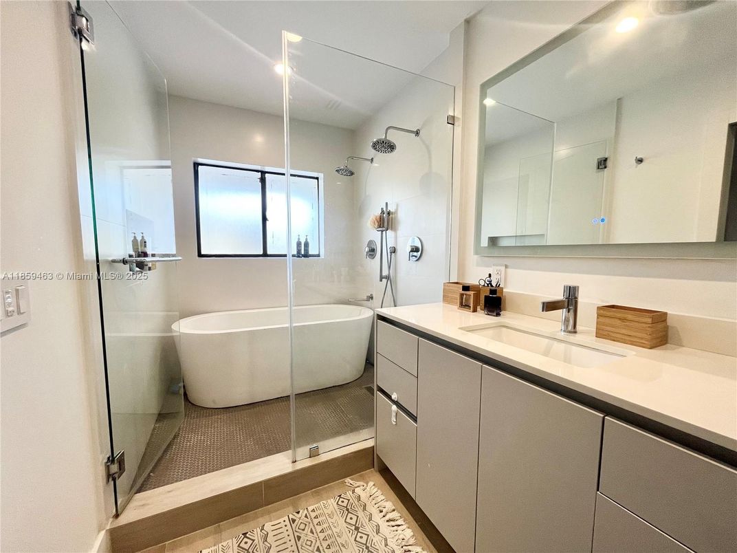 Bathroom, Dual Sink Vanities, Free Standing Baths, Glass Shower, Interior, Recessed Lighting