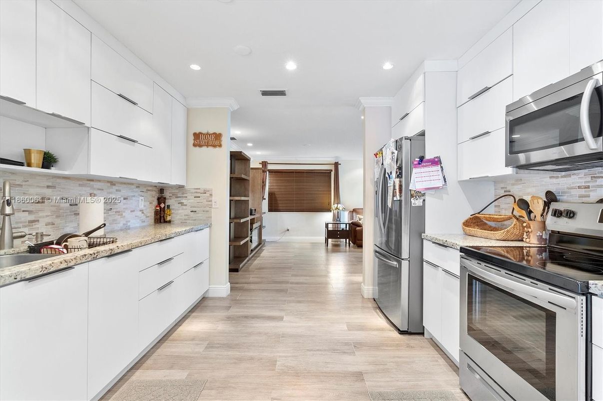 Interior, Kitchen, Recessed Lighting, Stainless Steel Appliances, Wood Texture Flooring
