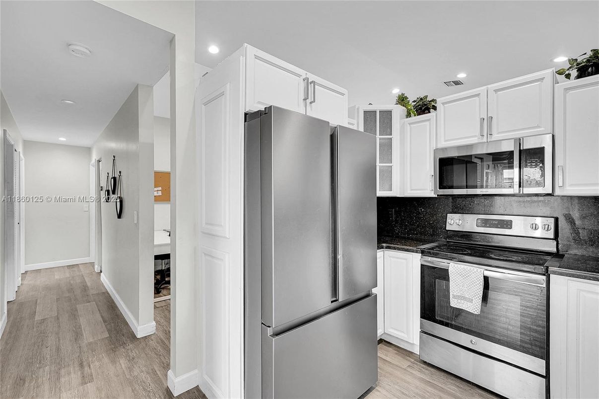 Interior, Kitchen, Recessed Lighting, Stainless Steel Appliances, Wood Texture Flooring