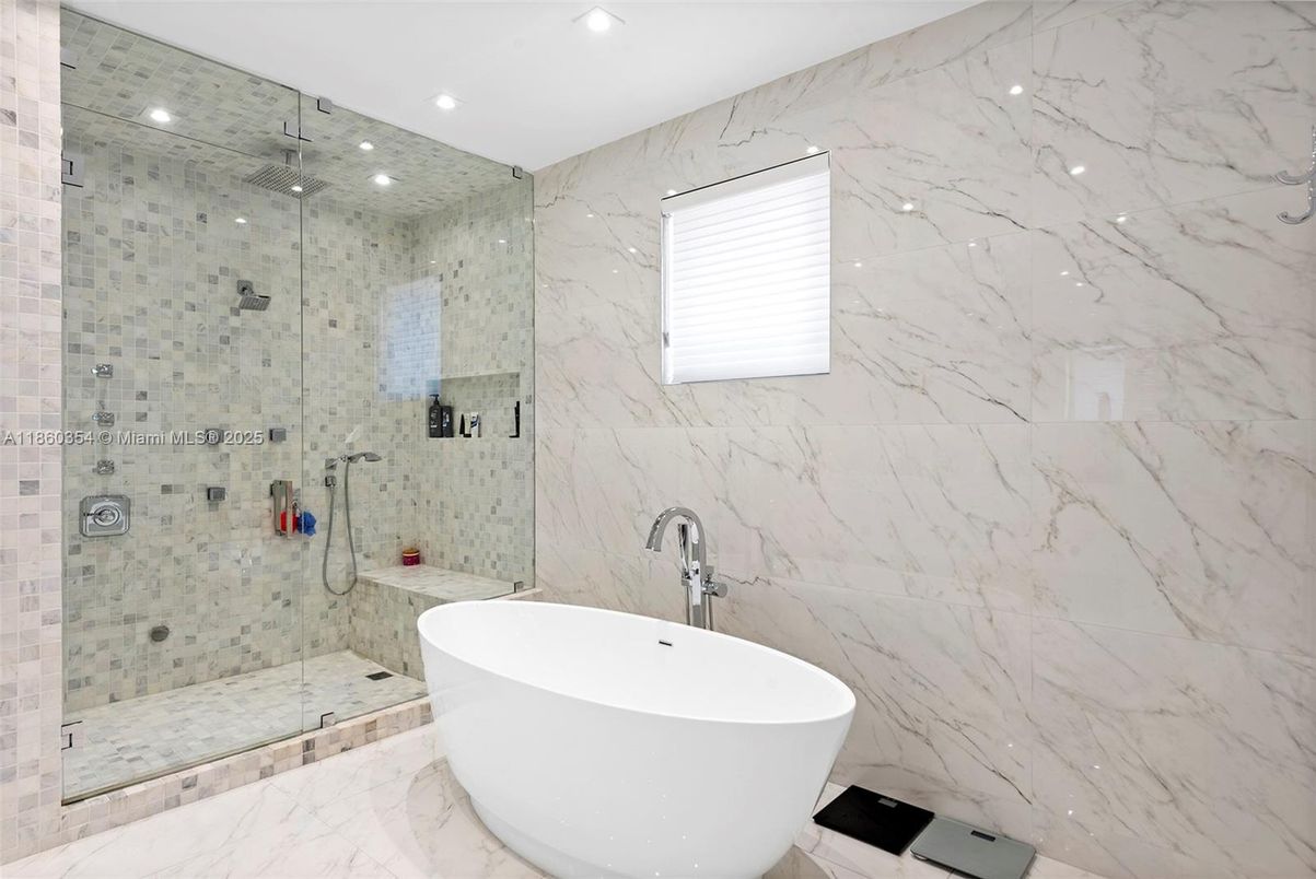 Bathroom, Free Standing Baths, Glass Shower, Interior, Marble, Marble Walls, Recessed Lighting