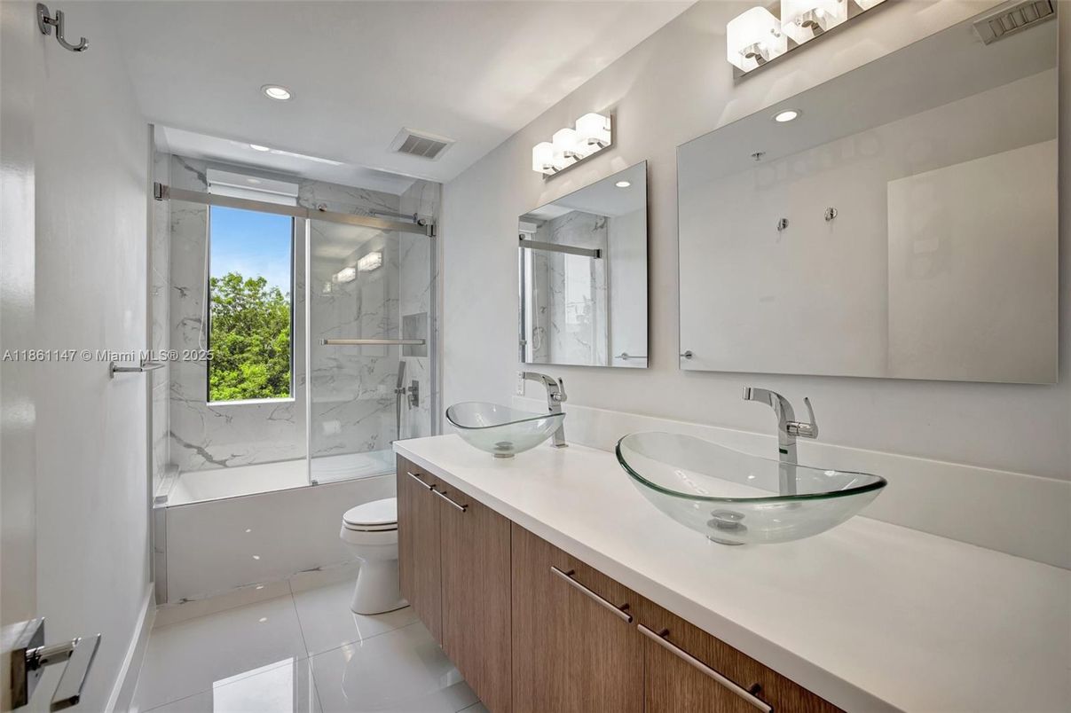Bathroom, Dual Sink Vanities, Glass Shower, Interior, Marble Walls, Recessed Lighting