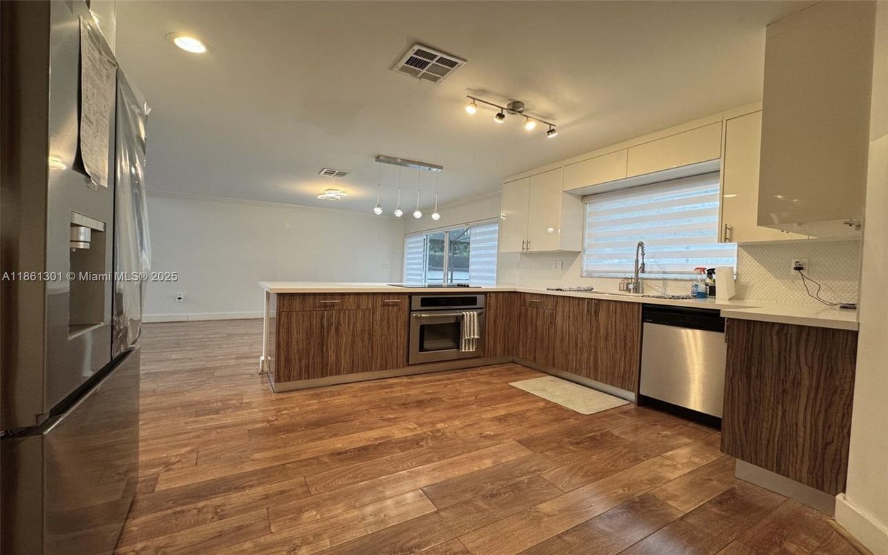 Interior, Kitchen, Recessed Lighting, Stainless Steel Appliances, Wood Texture Flooring