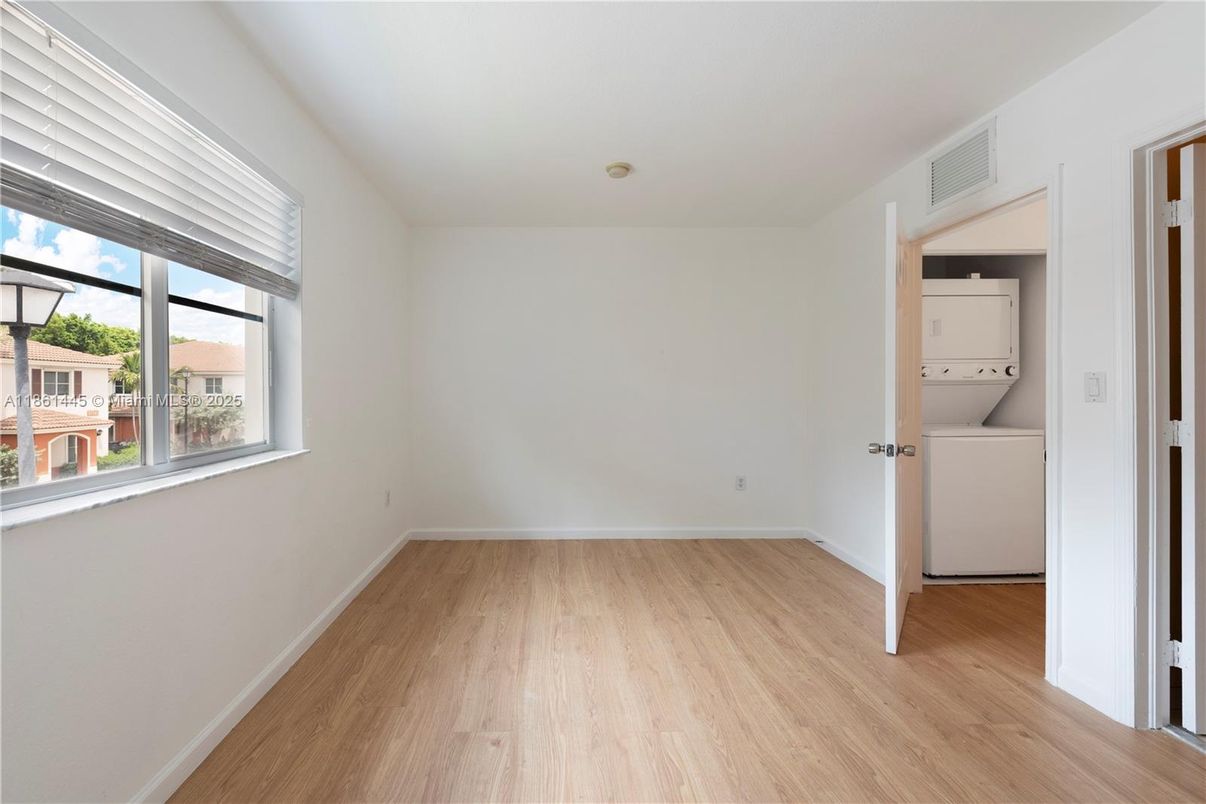 Empty room, Interior, Utility Closets, Washer, Wood Texture Flooring