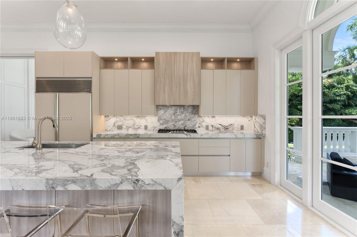 Interior, Kitchen, Marble Walls, Recessed Lighting, Stainless Steel Appliances
