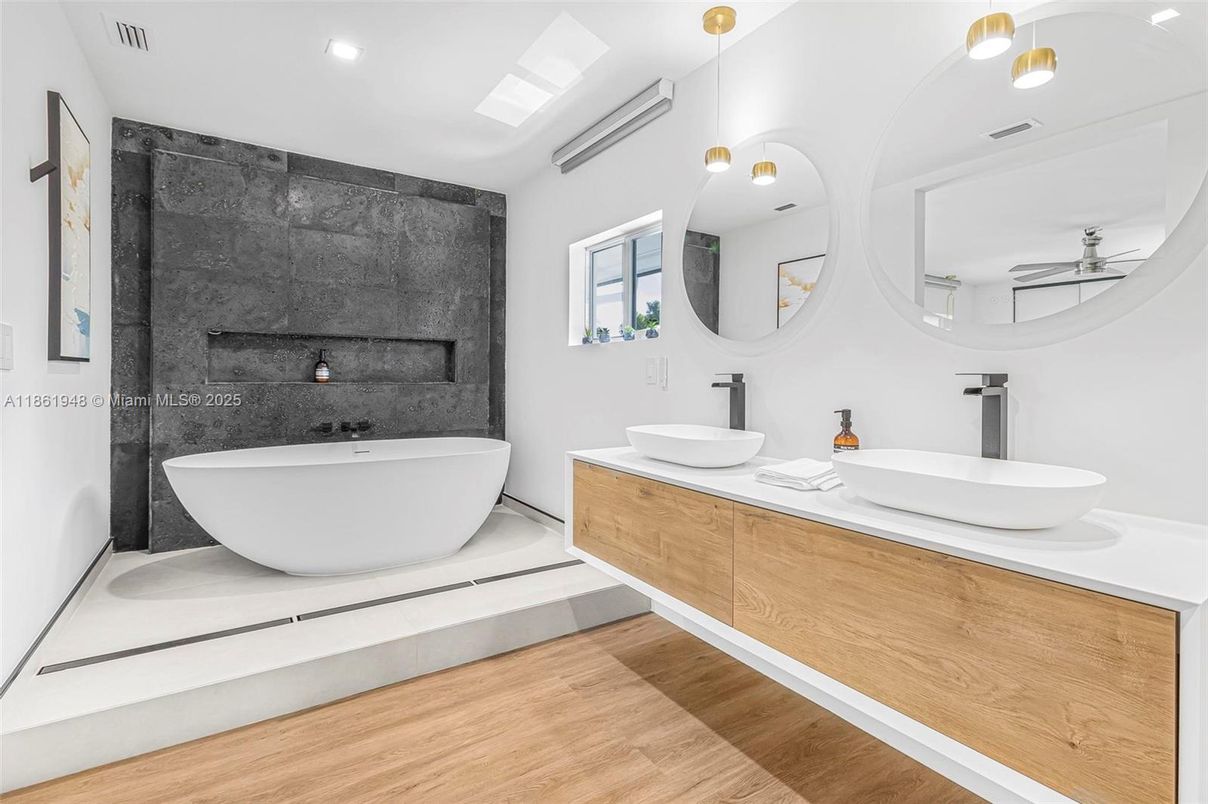 Bathroom, Dual Sink Vanities, Free Standing Baths, Interior, Recessed Lighting, Wood Texture Flooring