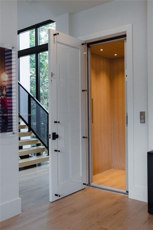 Elevator, Interior, Recessed Lighting, Wooden Ceilings, Wood Texture Flooring, Wooden Walls