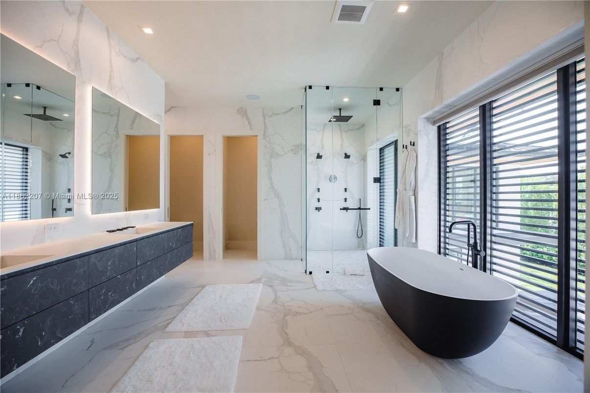 Bathroom, Dual Sink Vanities, Free Standing Baths, Glass Shower, Interior, Marble, Marble Walls, Recessed Lighting