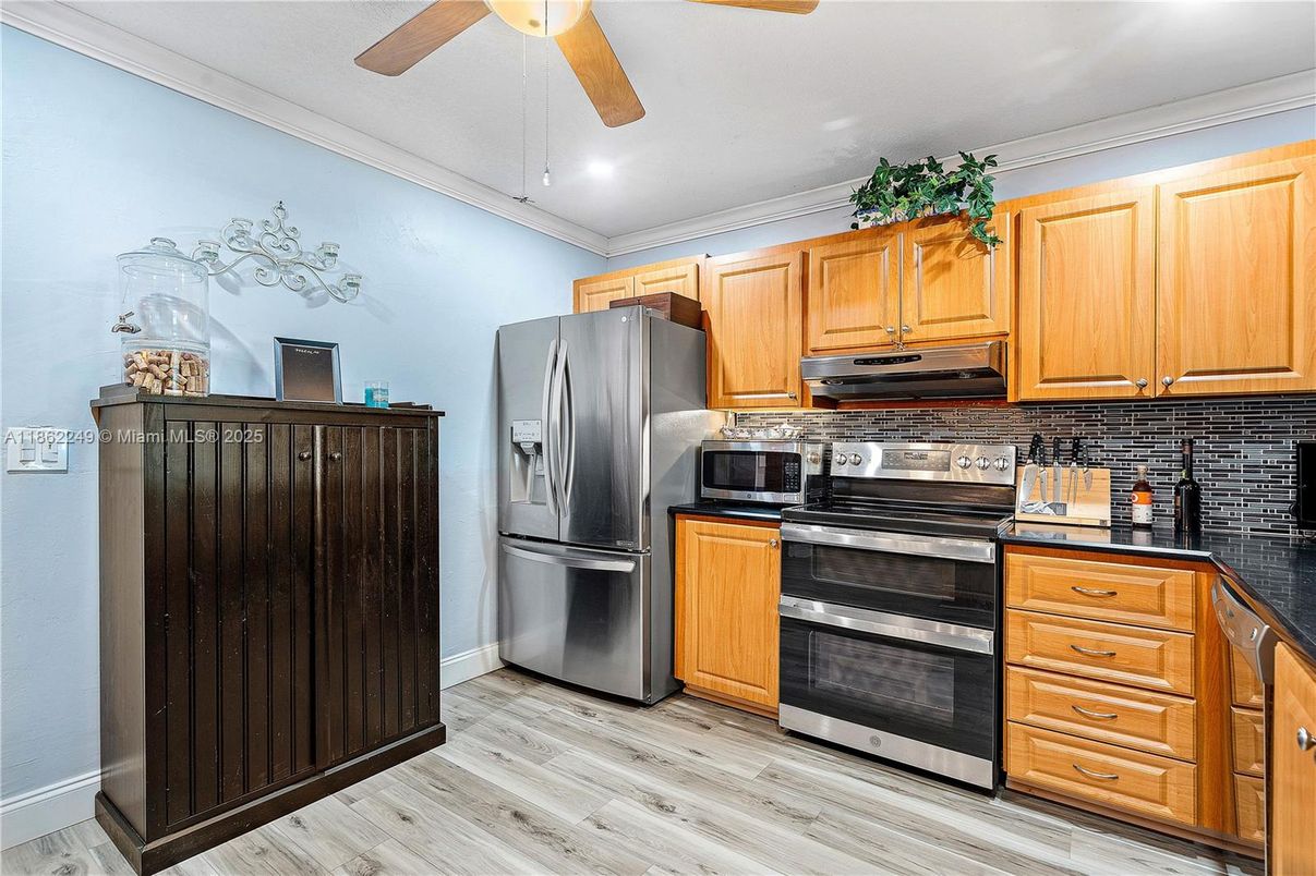 Interior, Kitchen, Recessed Lighting, Stainless Steel Appliances, Wood Texture Flooring