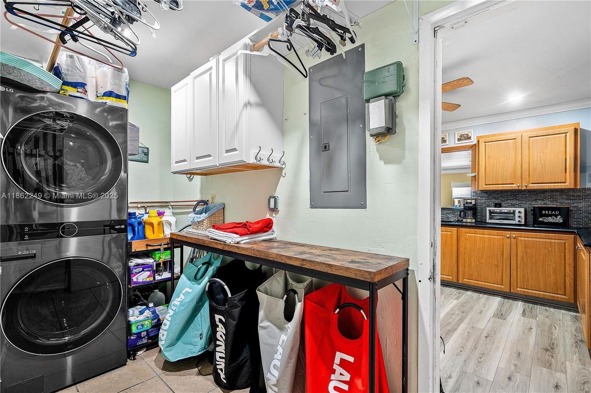 Interior, Kitchen, Recessed Lighting, Washer, Wood Texture Flooring