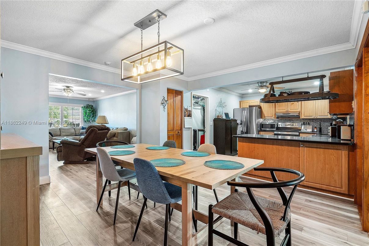 Dining room, Interior, Kitchen, Living room, Pendant Lights, Stainless Steel Appliances, Wood Texture Flooring
