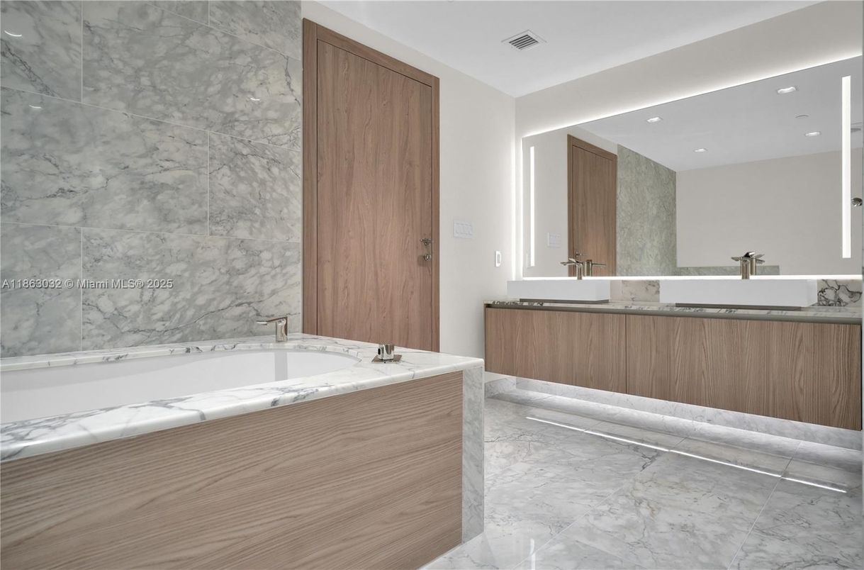 Bathroom, Dual Sink Vanities, Interior, Marble, Marble Walls, Recessed Lighting